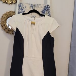 Knee-length black and white dress